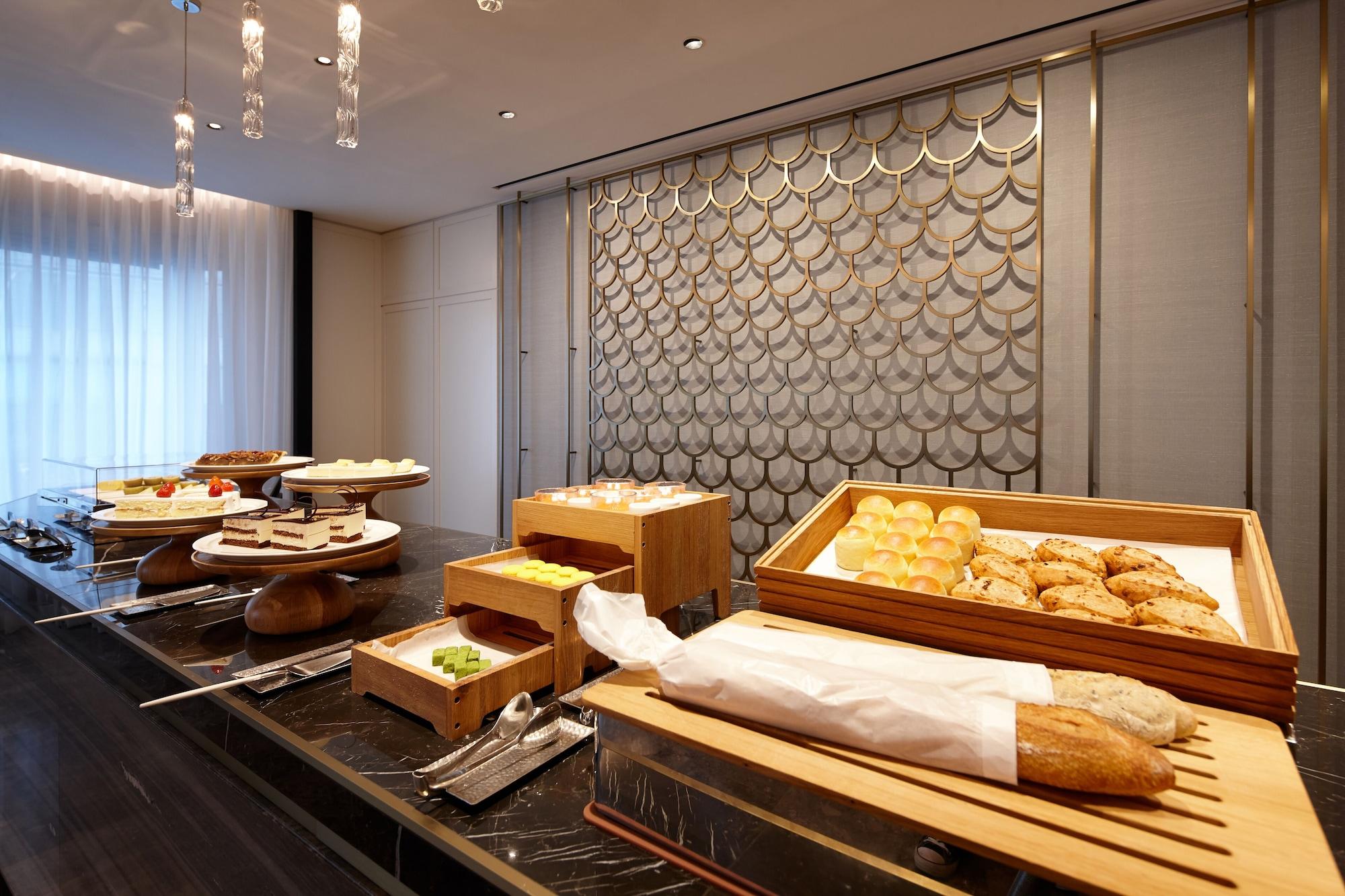 فندق لوتي، سيول إكزكيوتف تاور المظهر الخارجي الصورة A buffet at a hotel